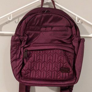 Lug Mini Orbit backpack, wine colored, tags on